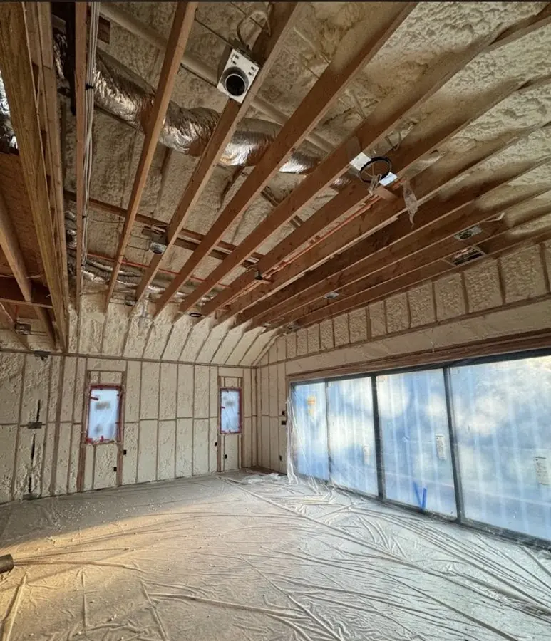 Interior walls and ceiling insulated with spray foam during new construction in Atwater
